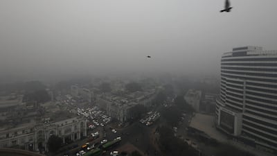 A thick layer of fog engulfs city sky line in New Delhi, India, Monday, Dec. 30, 2019.. The Indian capital which is witnessing the longest spell of cold weather in the last 22 years, woke up to a blanket of dense fog disrupting rail, road and air traffic adversely. (AP Photo/Manish Swarup)