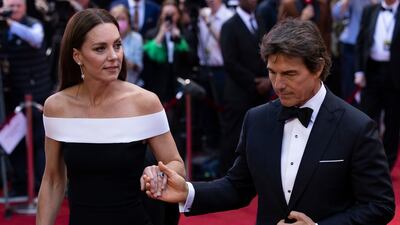 Catherine is accompanied by Hollywood star Tom Cruise at the Top Gun: Maverick Royal Film Performance at the Odeon Leicester Square, London, in May 2022