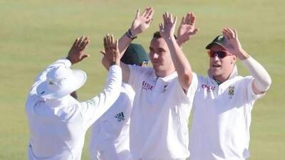 Kyle Abbott of South Africa, centre, celebrates the wicket of Pakistan's Saeed Ajmal during day 2 of their third Test match on Saturday. Lee Warren / Getty Images