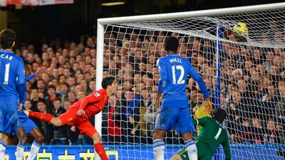 Luis Suarez once again hits the headlines, and finds a place in our team of the week. His clash with John Terry may have taken the Chelsea skipper out of the game, but his goal against them very much kept Liverpool in it. Russell Cheyne/Reuters