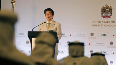 Japan's Prime Minister Shinzo Abe speaks during a Japan-UAE Business Forum in Abu Dhabi on April 30, 2018. Karim Sahib / AFP
