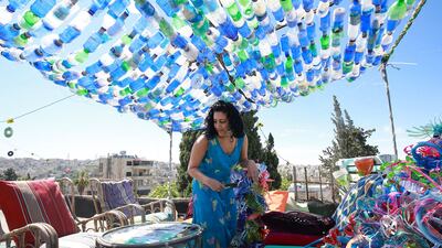 The artist urges people to avoid buying plastic products and to go shopping with reusable bags, and also advocates a tax on single-use plastics.