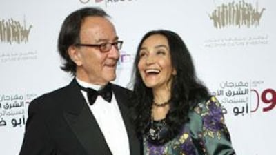 Peter Scarlet, the MEIFF director, and his wife arrive for the opening night of the festival