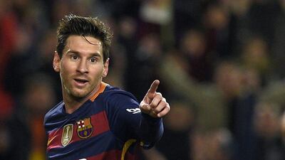 Lionel Messi celebrates a goal. Lluis Gene / AFP