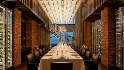 The luxurious dining room at 55 & 5th, The Grill, in the St Regis on Saadiyat Island.