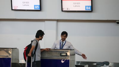 A traveller checks in at Air Arabia counters at Ras Al Khaimah International Airport. Photo: Shereen El Gazzar
