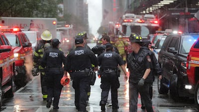 Emergency services first responders arrive at 787 7th Avenue in midtown Manhattan. Reuters