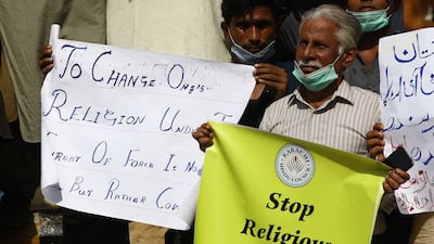 Pakistani Hindu minority members shout slogans during a protest against the attack on their temple in Rahim Yar Khan, in Karachi, Pakistan. EPA