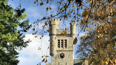 The famous square clock tower at Carbisdale Castle, with clock faces on only three sides at the Duchess of Sutherland's request.