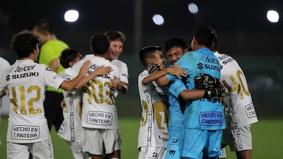 Player of Pumas Unam celebrate winning the U14 Mina Cup final.