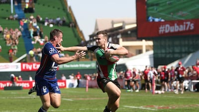 Abu Dhabi Harlequins, green and red, have won the last three Gulf Men's League finals at Dubai Rugby Sevens. Victor Besa for The National / December 3, 2016