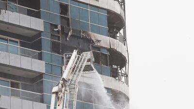 Aftermath of the fire at Zen Tower in Dubai Marina. Leslie Pableo for The National