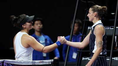 Bianca Andreescu, left, of Canada shakes hands with Karolina Pliskova. Getty