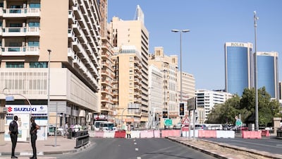 Police close off Baniyas Road, which runs along the Creek on the Deira side