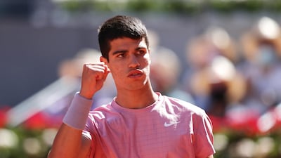 Carlos Alcaraz celebrates winning a point against Rafael Nadal. Getty