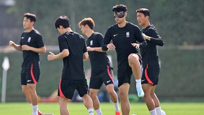 Son Heung-min with his South Korea teammates. AFP
