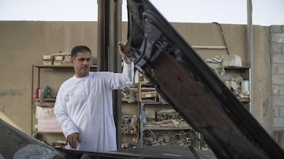 Garage owner Hassan Al Aleeli says few drivers regularly check their vehicles. Antonie Robertson / The National