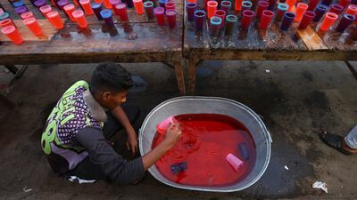 Sugary drinks are prepared for iftar in Karachi, Pakistan. EPA