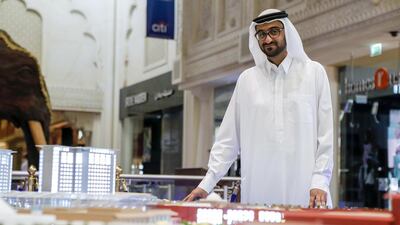 Omar Khoury, head of retail at Nakheel, with a model of the planned extension work to be done on Ibn Battuta Mall. Antonie Robertson / The National