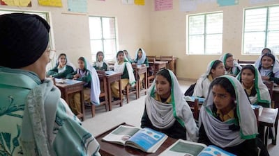 Sheikha Jawaher Al Qasimi visits a school in Pakistan. Courtesy: Wam