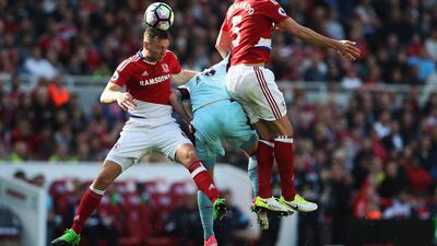 Daniel Ayala of Middlesbrough wins a header over a Burnley defender. Ian MacNicol / Getty Images