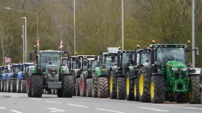 Some of the tractors that later descended on central London during rush hour for the protest. PA