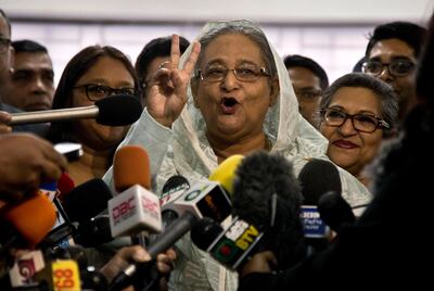 Bangladesh Prime Minister Sheikh Hasina flashes a victory sign after casting her vote in the 2018 parliamentary elections. AP Photo