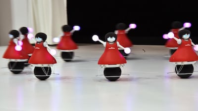 Electronic parts maker Murata Manufacturing unveils 10 small cheerleading robots, known as the 'Murata Cheerleaders'. Yoshikazu Tsuno / AFP