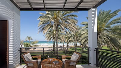 The Chedi Club Suite terrace overlooking the beach.
