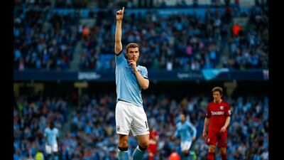 Manchester City's Edin Dzeko celebrates scoring against West Bromwich Albion during at The Etihad Stadium in Manchester. (Darren Staples / Reuters)