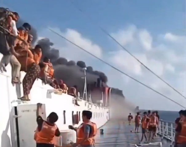 Image linked from the original feed: Five dead and 41 missing after Indonesian ferry catches fire, authorities say