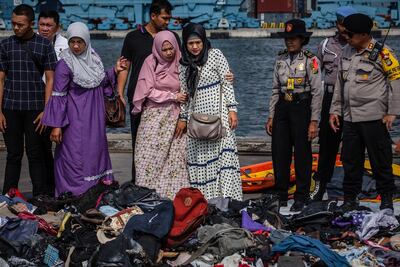Families of the victims of Lion Air flight JT 610, visit an operations centre to look for personal items of their relatives, at the Tanjung Priok port. Getty Images