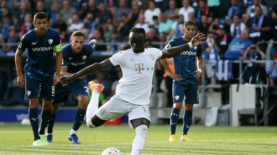 Bayern Munich's Sadio Mane scores their fifth goal from the penalty spot against Bochum. Reuters