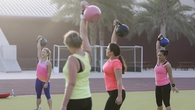 Women exercise in Dubai Sports City in Dubai. Getting fit is one the most popular of all New Year's resolutions (Photo by: Sarah Dea/The National)