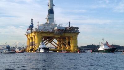 Kayakers try to block the departure of the Shell Oil Polar Pioneer rig platform to be used in offshore drilling operations in Alaska as it moved from Elliott Bay in Seattle, Washington. Shell on September 28, 2015 scrapped its controversial offshore exploration in Alaska after failing to find sufficient quantities of oil and gas, and also cited high costs and challenging regulation. Tim Exton / AFP