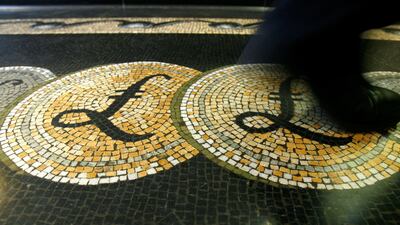 A mosaic of pound sterling symbols set in the floor of the front hall of the Bank of England. The pound has tumbled. Luke MacGregor / Reuters