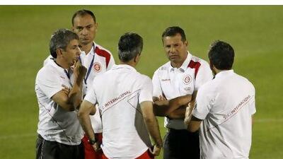 Celso Roth, second right, speaks with his assistants in Abu Dhabi this week. Hassan Ammar / AP Photo