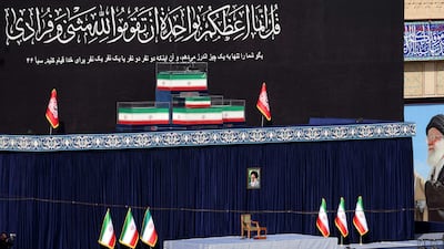 The coffins of Mr Khamenei and his family members at the Grand Mosalla. AFP