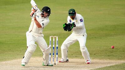 Tom Latham did one better than his father by scoring his second Test century for New Zealand in Dubai on Monday. Warren Little / Getty Images