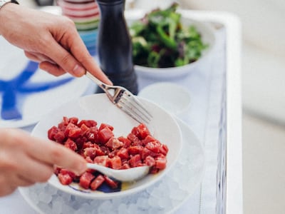 The tuna tartare is prepared at the table. Photo: Riviera by Jean Imbert