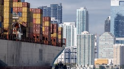 A container ship arrives in Miami, Florida. The UAE exports aluminium to the US. EPA