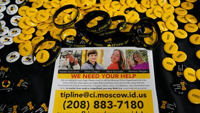A flyer seeking information about the killings of four University of Idaho students in Moscow. AP