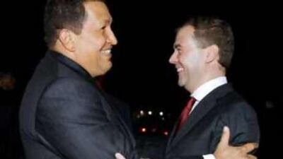 Bear hug: Hugo Chavez (left), the president of Venezuela, greets Dmitry Medvedev, the Russian president, in Caracas.