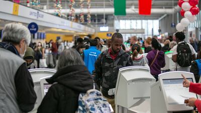 Passengers wait for the resumption of flights at O'Hare International Airport in Chicago, Illinois. Reuters