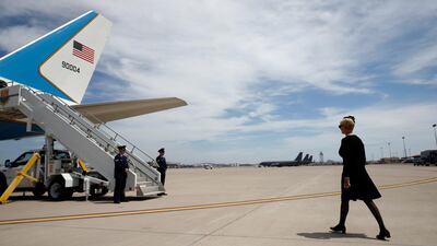 Cindy McCain, widow of Senator John McCain, walks to board a military passenger aircraft after the casket of her husband was loaded at the airport. AP Photo/Jae C. Hong