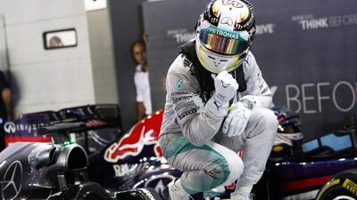 Lewis Hamilton reacts after winning the Singapore Grand Prix in September. Xavier Galiana / Reuters / September 21, 2014