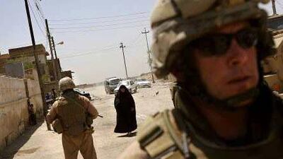 US troops on patrol in Basra: Agility, a Kuwaiti supplier, overcharged the US by millions of dollars, the US government says.