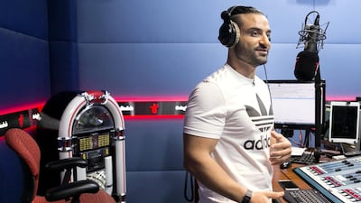Kris Fade of The Kris Fade Show at the studio at Arabian Radio Network. Reem Mohammed / The National