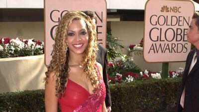 Beyonce, in scarlet sequins, attends the 58th annual Golden Globe Awards held at the Beverly Hills Hotel on January 21, 2001 in Beverly Hills, California. Getty Images