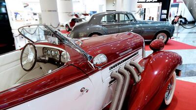 An elegantly styled red Auburn Speedster 1936 stands out at the Roaring Engines Like Never Before show. Pawan Singh / The National